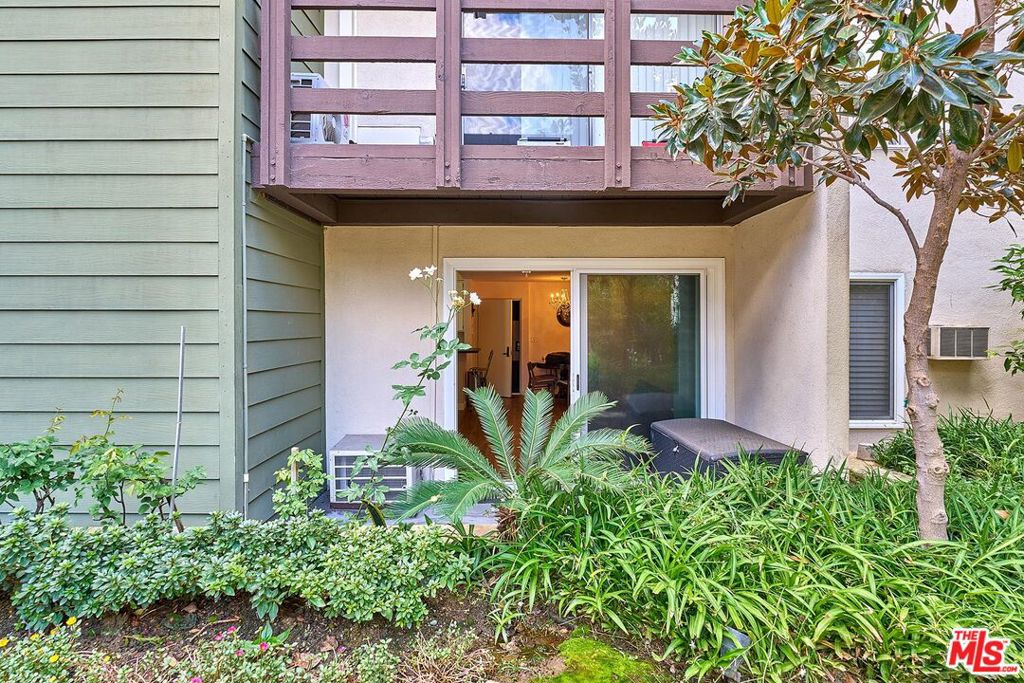 This cozy 1 bedroom, 1 bathroom condo is located in the heart of K-Town. The unit has a spacious private patio that connects to the building's main garden, giving you the feeling of having your own yard and the comfort of a single-family home. Inside, you'll find a well-kept bedroom and bathroom, along with a lovely chandelier light in the living area. The patio is perfect for relaxing, gardening, or enjoying morning coffee while overlooking the greenery. The building offers great amenities, including a Gym, Jacuzzi, and Sauna, making it easy to stay healthy and relax without leaving home. This condo is a great choice for anyone looking for a quiet and comfortable space in a very convenient location close to shops, restaurants, and public transit. Note: Buyer and Buyer's Agent to check and verify all information, including square footage and building details.