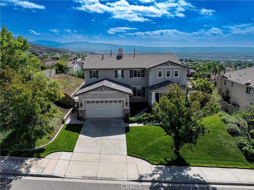 JUST LISTED!!  Stunning pool home with panoramic views in East Highland.  Welcome to Easton Lane, a beautifully maintained home offering the perfect blend of comfort beauty, and resort-style living.  This is one of the best jewels in the Ranch.  Nestled in a highly sought after neighborhood, this property features a sparkling pool, with 3455 square feet with breathtaking views of the surrounding mountains and City lights.  As you enter, you are greeted with soaring ceilings and an abundance of natural light that flows through the open concept living and dining areas.  This home boasts a well appointed kitchen with beautiful granite countertops, plentiful cabinetry, stainless steel appliances with dual ovens, walk in pantry with easy access to the backyard and ideal for entertaining and family functions. The upper level offers a private primary suite with a luxurious amenities, walk in closets and sweeping views that create a true retreat.  This beauty features a whole house central vacuum system, multi room Bose speaker system, slate flooring, recessed lighting, mirrored closet doors, and distinctive ceiling fans throughout.  Located in the prestigious East Highland Ranch and Redlands School District where you will have access to Spring Valley Lake for fishing, Tennis Courts, Basketball Courts, Volleyball Courts (sand), Swimming Pools, Baseball Diamond, Soccer Field, Multiple Clubhouses, Shopping, Dining and much more.....