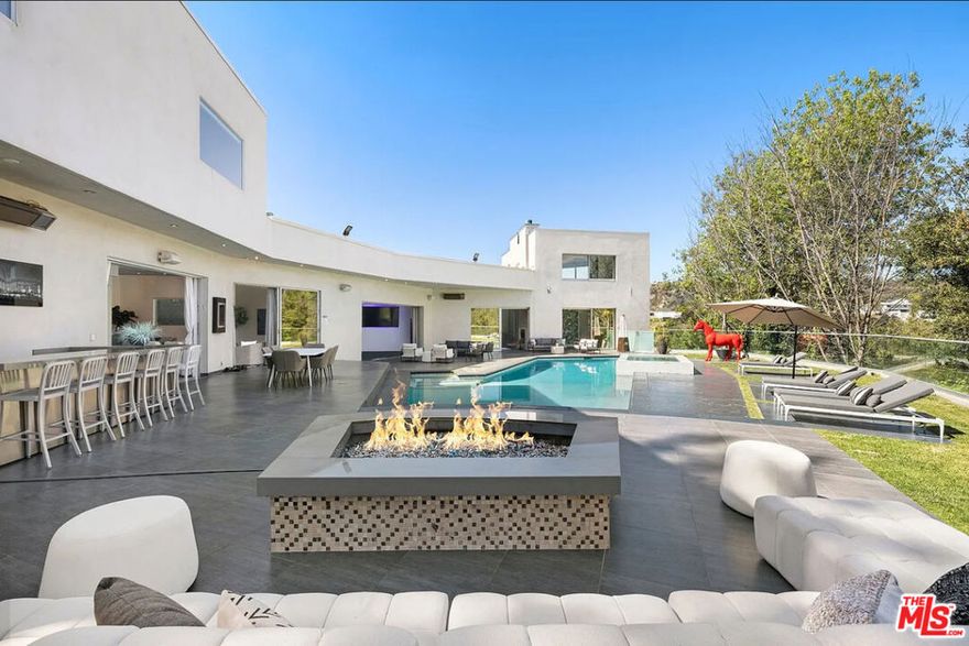 Welcome to a rare lease opportunity at 2666 Hutton Drive  a gated, ultra-private estate nestled at the top of a long, secluded driveway in one of the most prime locations in the city. This luxurious retreat offers the perfect blend of elegance, comfort, and total privacy, with sweeping canyon views and resort-style amenities throughout.Featuring 8 spacious bedrooms and 7 beautifully designed bathrooms, this residence is ideal for families or those who love to entertain. Inside, you'll find a gourmet chef's kitchen, soaring ceilings, and expansive glass walls that bathe the home in natural light, creating a warm, open, and inviting atmosphere.Step outside to experience true California living: a stunning 60-foot pool, private sports court, cozy fire pit, and multiple outdoor lounge areasall surrounded by tranquil, landscaped grounds. A generous motor court accommodates 15+ vehicles, making it perfect for entertaining or hosting events in style.Offered fully furnished and professionally staged, this turnkey estate is available for multi-month or extended leases. If you're seeking luxury, privacy, and a prime location, 2666 Hutton Drive is ready to welcome you home.