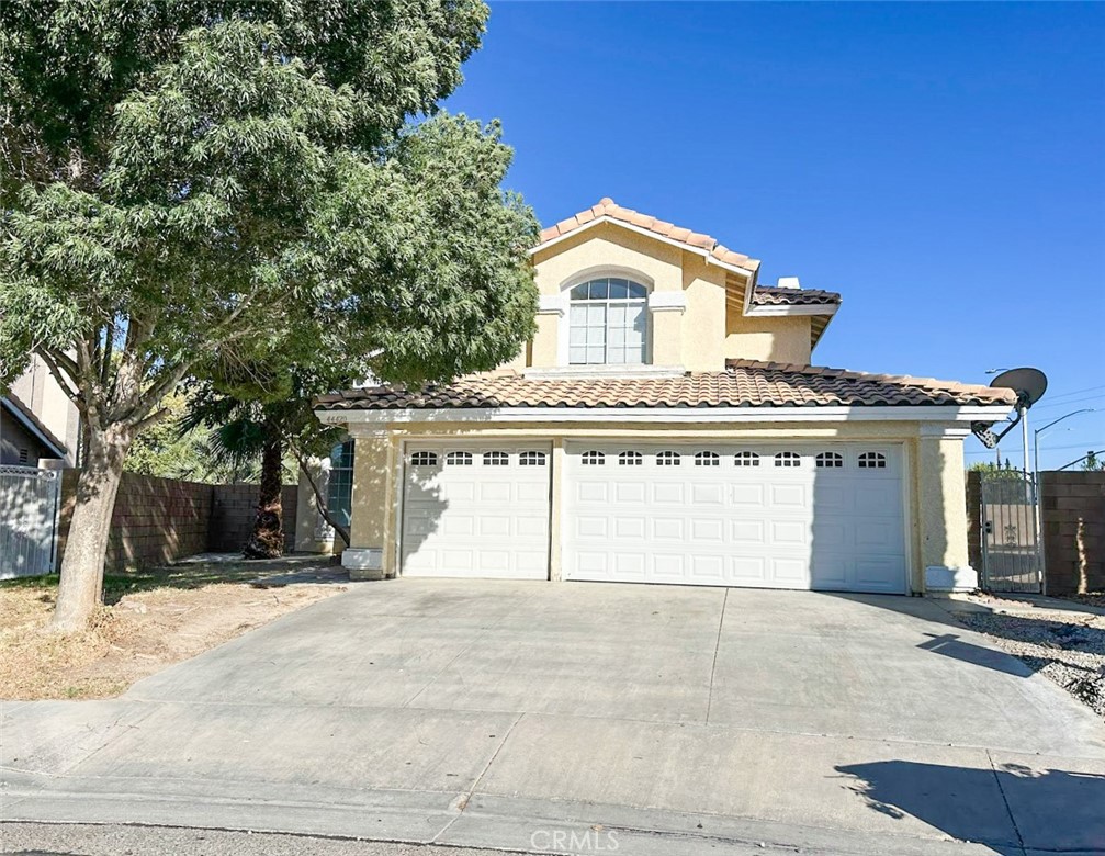 Spacious two-story home located in desirable West Lancaster, close to shopping, dining, the freeway, Antelope Valley College, Lancaster High School, and Amargosa Middle School. This property offers 4 bedrooms, 3 full bathrooms, and a 3-car attached garage. The upgraded kitchen features granite countertops and opens to the family living areas. The home includes vaulted ceilings, chandeliers, an elegant staircase, and a cozy family room with a fireplace and ceiling fan. One bedroom and full bath are conveniently located downstairs. Upstairs you will find Jack & Jill bedrooms and a large primary suite with dual closets. The property also features a formal dining area, dramatic mirrored entry, and a covered patio perfect for outdoor living. Situated on an 8,833 sq. ft. lot with 2,060 sq. ft. of living space, this home is move-in ready and ideal for family living.