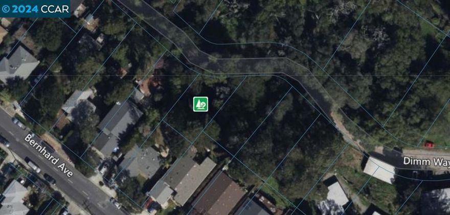 Prime Opportunity in Richmond – Your Future Awaits at Dimm Way  Attention contractors, builders, developers, and future homeowners! Discover an undeveloped lot on a serene, tree-lined road. This unique parcel offers a rare opportunity to create your dream home in a peaceful and exclusive setting, while still being close to the vibrant amenities of the San Francisco Bay Area.  Comprehensive topographical survey, Geotech soil report, and fault line studies have already been conducted, saving you time and effort.  Surrounded by mature trees, this lot offers privacy and a picturesque setting for your new home.  Act now and secure your slice of paradise in the Bay Area!  For more information and to discuss flexible financing options, including potential seller carry conversations, please contact us today.