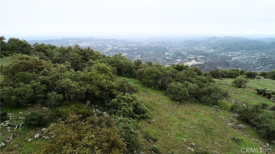 This special and rare property is located on the west side of Murrieta (just minutes west of the 15 freeway) and perfectly centered at the top of the full ocean view bluff.  There will never be any other homes across of the property as the Nature Conservancy owns large amounts of land that is set aside for the wild life and nature lovers.  The roads are paved to (and past) the property.  The elevation is 2,250' allowing for perfect weather condition with cool ocean breezes allowing expansive coastal views and Catalina Island on a clear day.  There is a fire hydrant, electricity, water, telephone, mail delivery, trash pickup, and internet at the property. The $120,000 water bond has been paid for.  The water main is in the street and ready for you to order your water meter installation.  This property provides peace and beauty for the next owner to build their custom dream home. Due to the perfect temperatures and rich soil allows for a great micro climate, which is perfect for growing grapes, avocados, and citrus.
