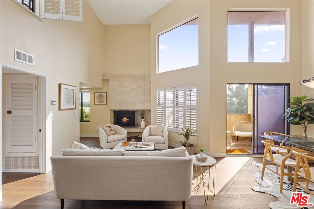 Top-Floor Corner Penthouse with Panoramic Views & Private Rooftop Deck & Large Living Room Patio: Welcome to one of the rarest offerings in West LA, an expansive top-floor corner penthouse perched where West LA meets Santa Monica & just 2.5 miles to the sand. Located at the intersection of Ocean Park Blvd and Centinela, this sun-drenched 2BD+Loft, 2BA home features soaring 25-foot ceilings, 2 large outdoors spaces, a wide-open floor plan, and dramatic city-to-mountain views from nearly every room. The fully renovated modern kitchen and new wide-plank flooring (just finished last month) create a fresh, airy aesthetic, while the oversized loft offers flexible space for a third bedroom, home office, or creative studio with attached outdoor patio and amazing views. The layout lives even larger than the square footage suggests, with incredible volume and flow throughout. Step onto your private rooftop deck, a true showstopper with sweeping vistas from the Getty to the Hollywood Sign. It's the perfect spot for morning coffee, sunset cocktails, or simply taking in the breeze and endless sky. Large living room patio offers additional outdoor space for relaxing and dining. Spacious bedrooms, in-unit laundry, ample storage, and two-car tandem parking complete the package. Bathrooms are in great condition and ready for your personal touch. As the best-positioned unit in the complex, this one faces outward over open mountain views, unlike most others that face other units or the busy streets. You really have to tour this one in person to understand how special it is. Even if it's slightly outside your price range, come see what's possible The natural light, volume, and private outdoor space are unmatched. Easy access to the 10 Freeway, Ocean Park Blvd shops and cafes, and all the best of the Westside. This is a long-term gem you won't want to miss. See pvt remarks for all showing requests.