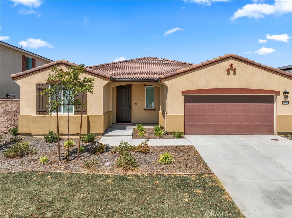Welcome to 11452 Pinon Trail, Yucaipa, CA 92399 – Modern Comfort Meets Timeless Design
Step into this stunning single-story home built in 2023 by renowned builder Woodside Homes. This thoughtfully crafted residence offers 4 bedrooms, 3 full bathrooms, and overflows with upscale features in a bright, open-concept layout.
Soaring vaulted ceilings and recessed lighting create an airy atmosphere, while premium vinyl plank flooring flows throughout the home. The spacious family room showcases oversized picture windows with automatic blinds and a sleek upgraded electric fireplace—perfect for cozy evenings.
The designer kitchen is a showstopper, featuring quartz countertops, a curved quartz island with breakfast bar seating, and Café stainless steel appliances including a built-in microwave, cooktop, dual wall ovens, and dishwasher. A farmhouse sink with touchless faucet, glass-insert cabinetry, and a large walk-in pantry elevate both form and function.
Retreat to the private primary suite complete with a luxurious ensuite bath—highlighted by a soaking tub, walk-in shower, dual vanities, and a generous walk-in closet. A large indoor laundry room with sink and storage shelves adds everyday convenience.
Additional highlights include:
Central heating and air conditioning
Tankless water heater
Fully drywalled garage with epoxy flooring
No HOA
Enjoy living just minutes from Yucaipa Regional Park, neighborhood trails, top-rated schools (Ridgeview Elementary, Park View Middle, Yucaipa High), and nearby shopping and dining.
This is California living at its finest—schedule your private showing today!