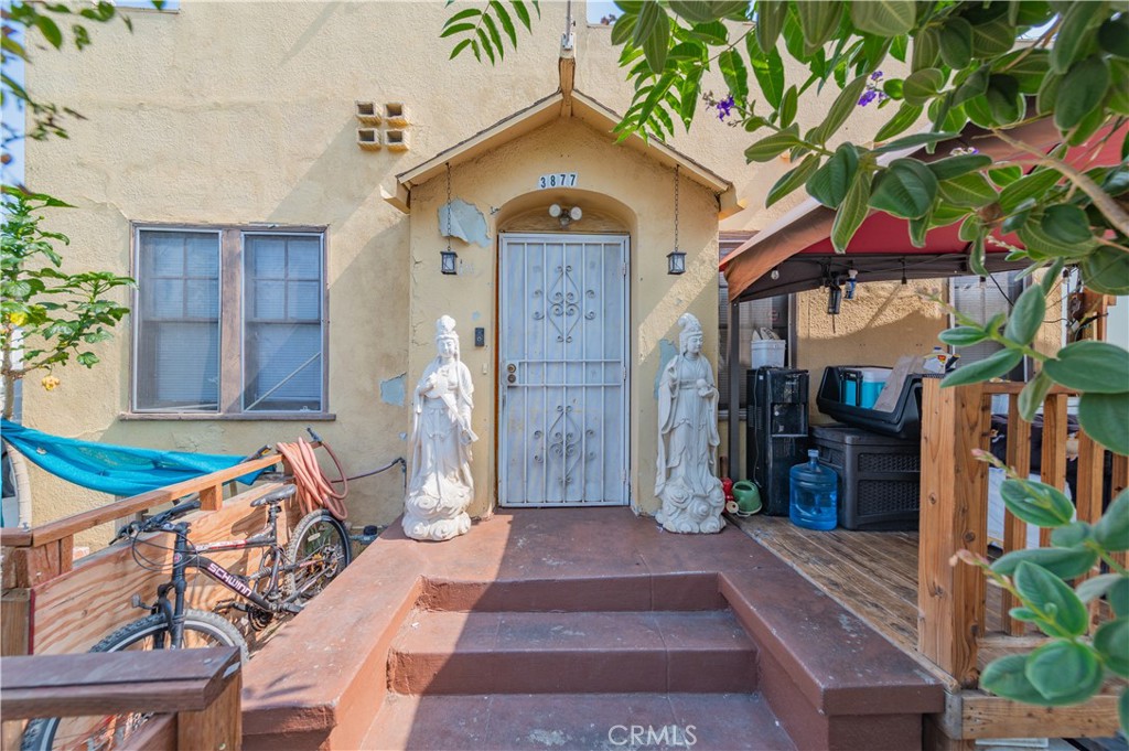 First time on the market! Located in the desirable Madison West Park neighborhood of East Hollywood, just minutes from Silverlake, this charming 1 bed / 1 bath home sits on a 2,502 SF lot with 805 SF of living space. The home has seen modest upgrades and has been well cared for by current tenants, who are on a month-to-month lease. Ideal as a rental hold or future development site.
Zoned for multi-family, this parcel can accommodate up to 3 residential income units. As such, the owner prefers to sell this property as part of a three-parcel package including:
*500 N Madison Ave – 3 bed / 2 bath / 1,301 SF / 3,000 SF lot – $549,000
*3875 Middlebury St – 2 bed / 1 bath / 667 SF / 2,002 SF lot – $399,000
Combined, the three lots total 7,504 SF of land with development potential for 9 units by right, or up to 17 units with the low-income housing designation. Total asking price for all three parcels: $1,477,000.
