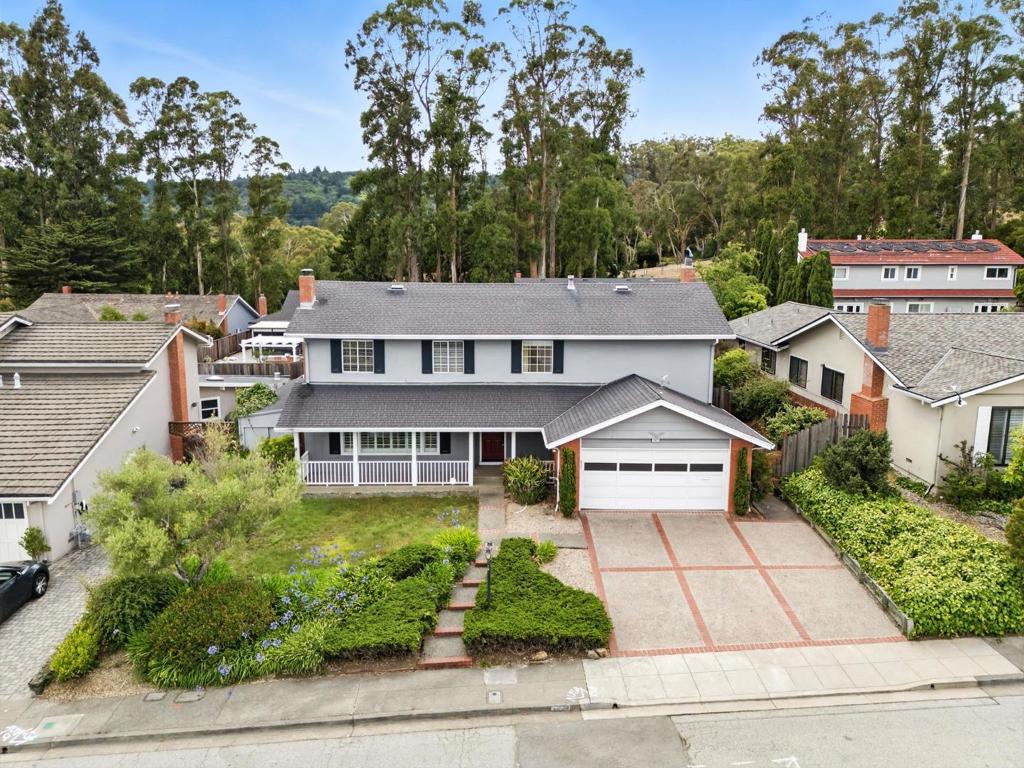 Welcome home to 1675 Escalante Way, a spacious 4-bedroom, 2.5-bathroom home located in the highly desirable Mills Estates neighborhood of Burlingame. This well maintained residence offers a functional and flexible floor plan. Downstairs features a formal living room, dining room, separate family room, half bath, a large kitchen with abundant cabinet space, room for a breakfast table & a conveniently located laundry closet. A sliding glass door off the kitchen leads to the expansive backyard, perfect for entertaining or relaxing & outdoor fun with a pool & hot tub. Upstairs you will find all 4 bedrooms are generously sized, offering space for family, guests, or a home office setup. The primary bedroom features a walk in closet & ensuite bathroom. Additional highlights include a 2 car garage, driveway parking for two more vehicles, & ample street parking. Mills Estates is known for its elevated lots, proximity to top-rated schools, easy access to SFO, BART, Caltrain, and Hwy 280, and its location near shops, parks, and the vibrant downtowns of both Burlingame and Millbrae. Outdoor enthusiasts will appreciate the nearby Mills Canyon Trail & Skyline Trail access just minutes away, offering panoramic Bay and ocean views. Do not miss your chance, this is Burlingame living at its best!
