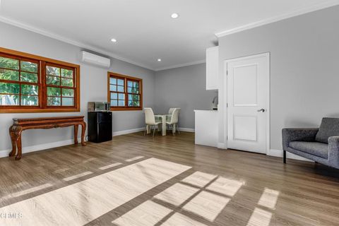 Photo of 1115 S Wilton Place #A, Los Angeles, CA 90019 (MLS # P1-26796)