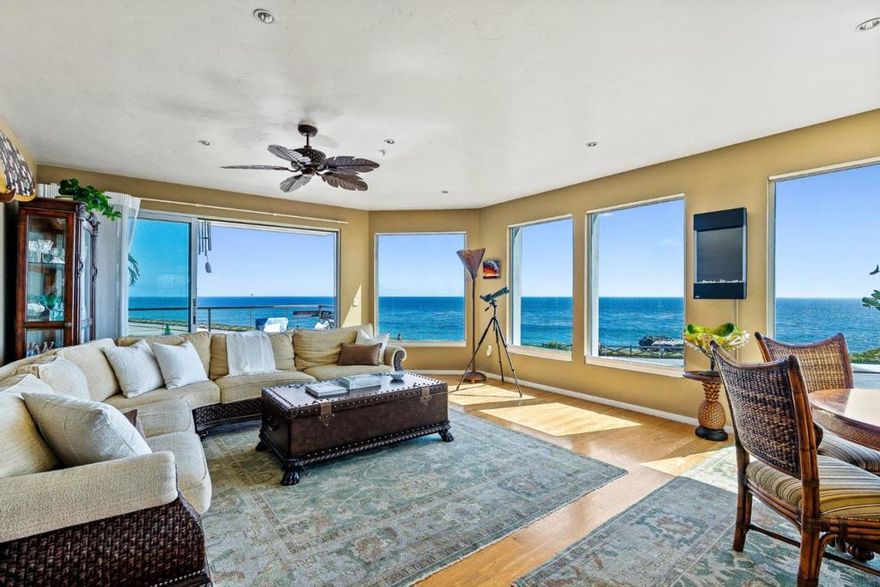 Welcome to your dream home at 890 West Cliff #8. Embrace the stunning 180 degree sweeping views of Monterey Bay. This single-level condo offers modern living with breathtaking sunrise to sunset ocean views. Front end unit has completely unobstructed lookouts with expansive windows throughout the entire home. Watch the vibrant coastal life, surfing, pelicans, whales, otters, seals, and sailboats along West Cliff Promenade. This immaculate condo showcases a modern & unique flair, featuring high ceilings and recessed lighting, oak floors, and an open floor plan making it perfect for entertaining. Chef's kitchen features stainless steel appliances and granite countertops. With 1,443 square feet of living space, this home offers two spacious bedrooms and two full bathrooms, with master suite, providing ample comfort and privacy. The covered patio deck is perfect for enjoying the jaw dropping waterfront views. For convenience this property boasts a detached garage with included storage. Located in the heart of Santa Cruz, this turn-key condominium has direct access to the best of coastal living. Step outside your door to experience & explore Lighthouse Field and West Cliff Drive, world-class surfing, and scenic beauty. Embrace the coastal lifestyle in this exceptional oceanfront home.