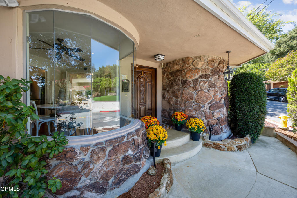 Welcome to this charming 1964 California Ranch, lovingly owned by one family and never before on the market. The inviting step-down living room features a fireplace, large sliding doors that open to the backyard, seamlessly connecting to the cheerful kitchen and an expansive family room--perfect for gatherings and entertaining. Down a long private hallway, you'll find three spacious bedrooms, each with generous closets. The primary suite offers its own sliding doors with peaceful views of the serene backyard. A versatile bonus room makes an ideal art studio or creative retreat. The oversized garage provides a dedicated work area and abundant storage. With its bright, airy interiors and timeless warmth, this home is ideally located near Downtown LA, The Americana at Brand, and the heart of Glendale.