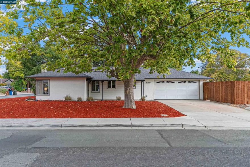 Welcome to 2049 Elinora Drive, a beautifully updated home in the heart of Pleasant Hill’s desirable Gregory Gardens neighborhood. This expanded 4-bedroom, 2-bathroom home offers approximately 1,455 sq ft of living space, thanks to a fully permitted addition that added two spacious bedrooms and a full bath.  Inside, you’ll find a thoughtfully remodeled interior with a new roof and HVAC system. The light-filled living room features a cozy wood-burning fireplace and flows seamlessly to the dining area and updated kitchen. The kitchen showcases new cabinetry, quartz countertops, under-cabinet lighting, and modern appliances.  New flooring throughout is complemented by recessed lighting, fresh paint inside and out, crown molding, and stylish fixtures. The finished garage with epoxy floors, built-in storage, and upgraded plumbing provides a versatile space for a home gym, workshop, or projects.  Just minutes from downtown Pleasant Hill, local parks, trails, and shopping with easy access to BART and major freeways, this move-in ready home truly checks all the boxes for comfort and convenience.