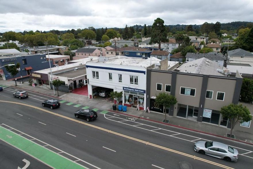 Pleased to present the opportunity to acquire 1131-1137 California Drive, a two-story mixed-use building located in the heart of Burlingame, California. This approximately 8,034 square foot property, built in 1962 on a 5,750 square foot lot, features a blend of commercial and residential spaces, offering stable in-place income with upside potential. The ground floor is fully leased to two established retail tenants: a nail salon (Burlingame Nail Care) and an auto body shop, providing reliable cash flow. The second floor consists of two recently renovated 2-bedroom, 1-bathroom residential units, both currently vacant and ready for immediate occupancy or leasing at market rates. The property is zoned CMU (California Drive Mixed Use). The zoning is designed to foster vibrant, pedestrian friendly development along California Drive. The zoning encourages a blend of commercial, retail, office, and residential uses to create a dynamic urban environment. The zoning supports diverse businesses, housing options, and community spaces while adhering to development standards that ensure capability with the surrounding area. The seller recently did a feasibility study which shows redevelopment plans for a three story, 10-room hotel.