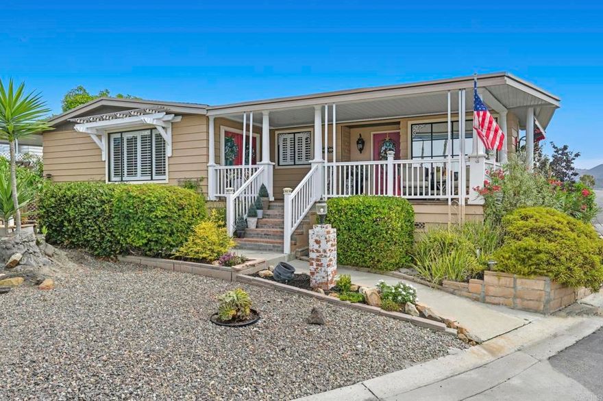 Sip your margarita while you enjoy your peek-a-boo ocean view sunset from your large custom porch in the beautiful and spacious 2 bedroom 2 bath located on a gently sloping corner lot surrounded by gardens, porches, patios, and views! Uniquely private and useable lot is completely landscaped front, back, and side yards. Low water succulents and plumeria in front, lime, lemon, and avocado in back and delicious fig on the side yard.  The large home has been wonderfully updated with space for formal living area, family area, and a den/office.  The large open kitchen with views to the west is perfect for the chef of the house.  Enjoy a large master bedroom with over sized closet and slider to a private patio.  Get ready for fun community activities or just unwind in your remodeled bathroom with quartz counters, lots of cabinet space and a claw foot tub.  Large lot is one of the most spacious in the Community and adjacent to 3 guest parking spaces and shady tree on the West side of home. Walking distance to putting green, lawn bowling, and picnic area. The community has a pickleball, pool, tennis courts, club house and community events!  Walk to shopping, bank and restaurants.   Located just a short drive from Carlsbad, Encinitas, Vista, or Escondido, this freshly extensively renovated home is Move-In Ready!  No  property tax.  Space fee is $584 per month and includes water/trash /sewer