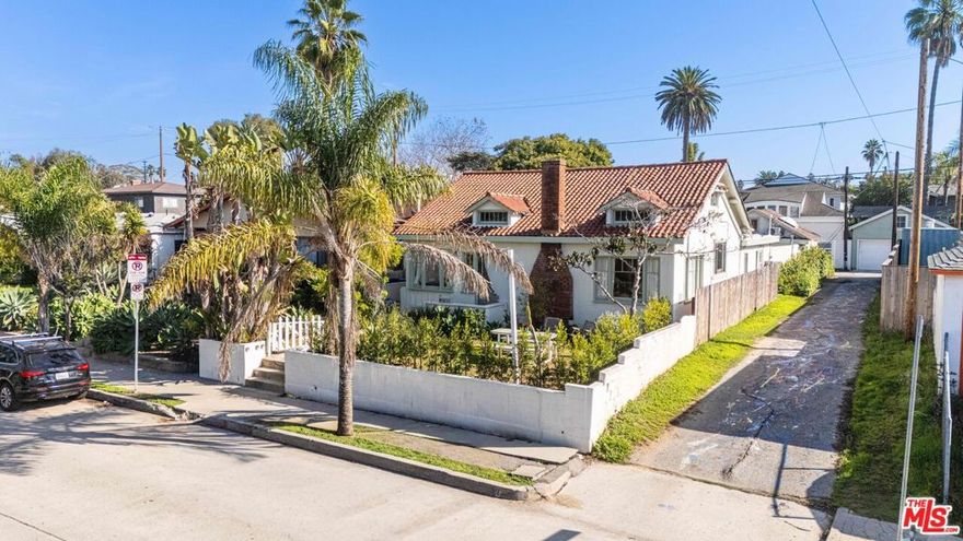 Welcome to your secluded escape in the heart of Venice Beach, where modern style meets timeless character. This updated compound features a sunlit main residence plus a detached guest house, all just moments from the restaurants, boutiques, and creative energy of Abbot Kinney.The main home offers three inviting bedrooms, two full baths, and a striking lofted space reached by a sculptural staircase that works beautifully as a studio, office, or guest retreat. A newly reimagined kitchen with custom cabinetry, quartz counters, and designer fixtures creates a true centerpiece for the home.Enjoy incredible privacy in the lush outdoor setting with mature greenery, only one neighbor, and a peaceful court street framing the property. Classic details like a vintage fireplace add warmth and personality throughout.The detached guest house with its own bathroom opens the door to flexible living options including a studio, guest suite, or income potential. Private parking with alley access completes the package.A rare Venice gem offering style, soul, and walkability all in one. Perfect for those looking to live, create, and unwind in one of the most iconic neighborhoods in Los Angeles.