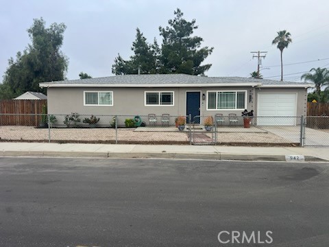 MOVE IN READY! Welcome to your Home Sweet Home! This home is waiting for its new owners, located in historical town of Perris. Your potential home features all new modern updates throughout the entire home it was remodeled 4yrs ago when purchased, which includes: Flooring, Paint and Finishes in every room. Grey shaker cabinets, with quartz counters to compliment the kitchen with new stainless steel appliances. Both bathrooms are fully updated as well with new cabinets, quartz top for the sinks and brand new shower /bathtub. Primary bathroom has been done with a beautiful custome tile w/tub. New 4yrs old windows throughout the home are energy efficent and lets in loads of natural light. New A/C unit is 4yrs old. New funace-6 monts old. Roof is 2 years old with a 50 yrs warranty, it is a Owens Corning Title 24 Cool Roof shingles in Sierra Grey with new wood, new membrane and low profile vents. The best part is the warranty comes with transferable warranty. No front or side neighbors for extra privacy. The only neighbors are in the back. Backyard is narrow with larger side yards and new wood fencing all around property, you will find a shed to store all your garden supplies, so not to take space in garage. Front yard is secured with fencing around front of house with a gate. Back yard is a very desirable. As for the garage it is located off the kitchen in the dinning room area for easy access to do laundry.