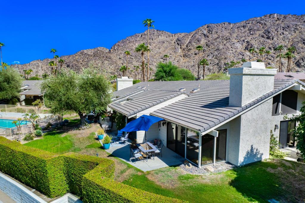Available for November 2025 through January 2026 for $4500 per month. Leased For Feb. through April 2026. Welcome to this charming 3-bedroom, 3-bath home nestled in Mountain Cove of Indian Wells where the Mountains provide a stunning backdrop. As you enter through the private courtyard patio, you'll immediately feel the warmth and charm. The interior features wood beam ceilings and a wall of windows looking out to the views offering loads of natural light. The Saltillo tile flooring adds a touch of rustic elegance complemented by a cozy wood-burning fireplace, a flat-screen TV & blinds for added privacy. The Chef's Kitchen is a culinary delight with Quartz Counters, equipped with Stainless Steel Appliances including a Wolf Gas Stove. Sliders from the Kitchen out to the Patio where you have a Gas BBQ. The Primary bedroom features a king-sized bed, plantation shutters, TV and an en-suite bathroom with a glass-enclosed tiled shower, dual vanities, and a generous walk-in closet. The 2nd Guest room includes a Queen bed with its own en-suite bath ~ a private retreat for visitors. The versatile 3rd Guest room/office boasts a Queen pullout sofa, a desk, Wet bar with an Ice maker, and en-suite bath, making it perfect for guests or as a home office.A two-car garage complete the home. Step out to your private patio and enjoy al fresco dining while taking in breathtaking sunsets. Enjoy the community pool just steps from your back patio. Minutes to BNP Paribas Tennis Open, Indian Wells Golf Resort and El Paseo for Shopping and Dining options.