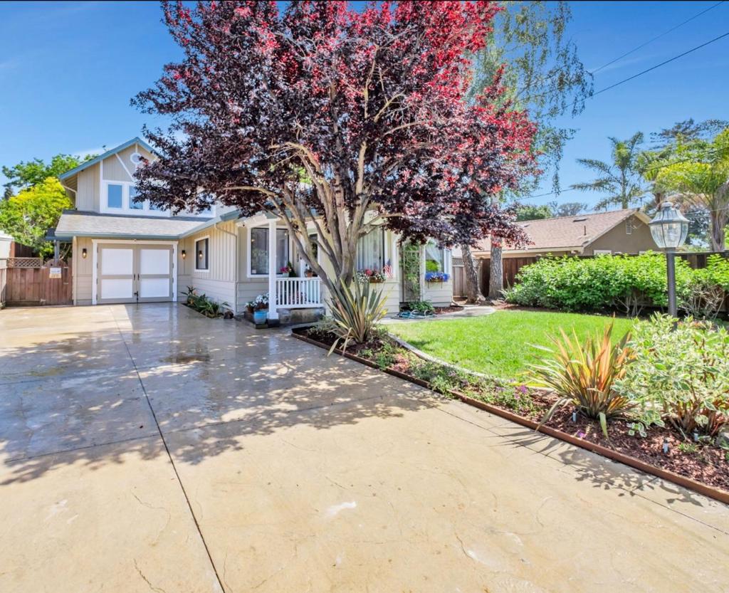 COUNTRY CHARM ON A QUIET STREET IN SUNNY CORRALITOS. Have you ever dreamed of stepping back in time to a slower pace, but without giving up any of the modern conveniences of life? This gorgeous turn-key Custom Craftsman Home has been lovingly restored, updated, and legally added onto with/ Custom Woodwork and solid oak floors. The bright, open kitchen is a dream, featuring granite counters, a custom wood island, and a farm sink, all ideally located right off the dining room, making it perfect for entertaining. The spacious primary bedroom suite has custom-built-ins and mountain views. A bonus feature is the attached mother-in-law unit. The expansive custom landscaped front and backyards feel like your own private park and Farmers Market right outside your door. The Travertine Patio and Spa with Fresh Rain, gazebo, garden area, chicken coop, and barn are rare additions to this custom craftsman home! Plus RV & Boat parking. In the Aptos School District, and 5 minutes to Monte Vista. This home is perfect for a family or a relaxing retirement sanctuary with enough room for the entire family to come for holidays, special occasions, and summer BBQs. Come see for yourself and experience what welcome home truly feels like.