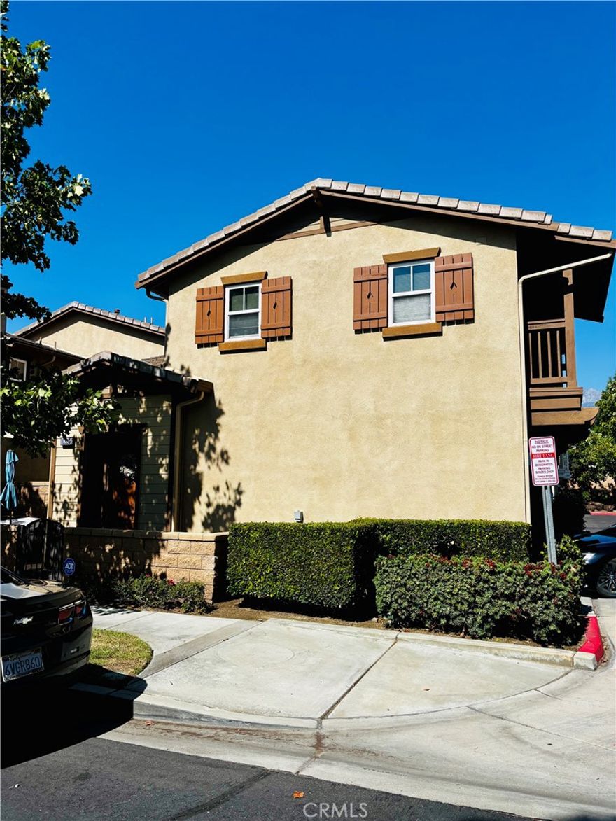 Highly desirable community in the beautiful Vinter's Grove neighborhood. This 2-bedroom 2 full bath corner unit condo offers a beautiful spacious open floor plan meticulously maintained by same owner since built. Kitchen, dining room spacious and opens to a balcony with an inviting fireplace. Custom cabinets in master bedroom, custom desk in bedrooms. Tesla Charger in the garage, plus many other upgrades. Very well maintained and secure gated community with amenities that include pool, spa, playground, BBQ, picnic and park areas. Key location, close to freeways, shopping, dining, parks, schools and much more! A must see.
