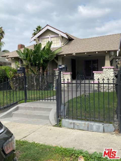 Photo of 815 W 50th Street, Los Angeles, CA 90037 (MLS # 25610157)
