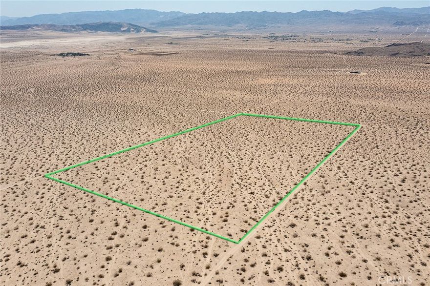 19.89-ACRES located in North Joshua Tree, near Joshua Tree Music Festival. Views of the National Park mountains to the south. Wide open land. Forever views. Great opportunity. NOTE: Green lines demarcating boundaries in pictures are approximate, as property has not been surveyed; street address is not official – do not use address or google map GPS to locate property. To find property, please locate with APN: 0606-321-14