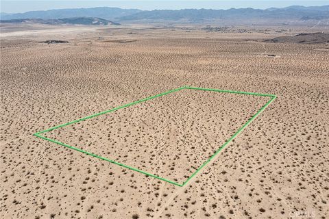 Photo of 1234 Sunever Road, Joshua Tree, CA 92252 (MLS # JT25181067)