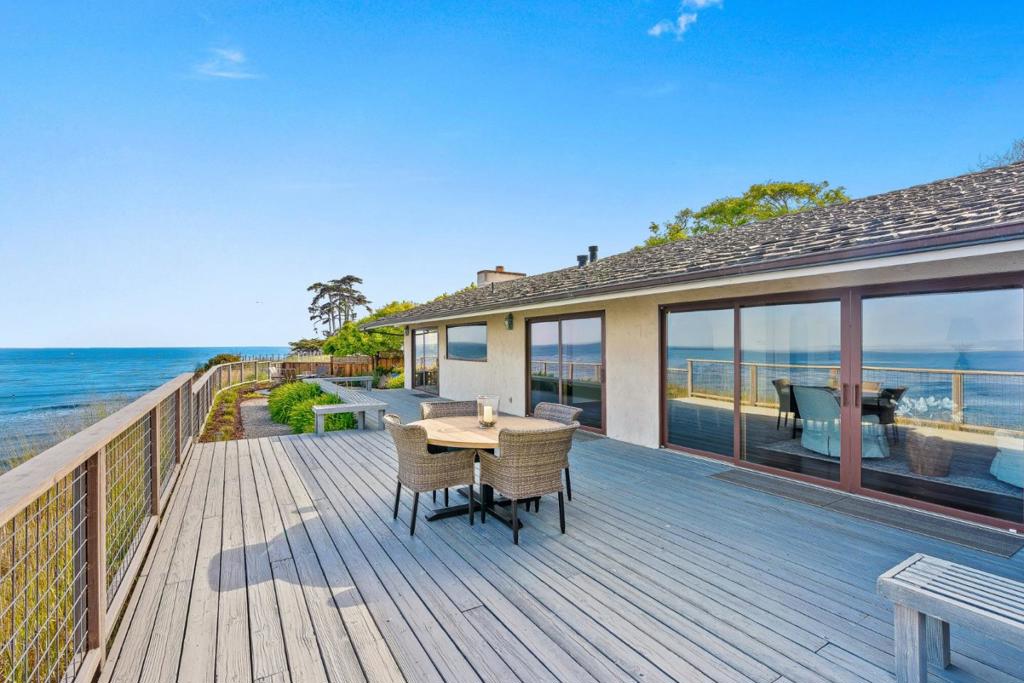 Welcome home to spectacular, unobstructed panoramic ocean views of Monterey Bay, from Capitola Wharf to Pacific Grove. This custom built, one-owner home has views like no other, with the sights and sounds of oceanside living from every room in the home, from sunrise to sunset, to twinkling lights at night, across the sweep of the bay. Situated on almost half an acre, this Mediterranean style home has spacious rooms, a vaulted ceiling in the great room, and walls of windows. Overlook World Class surfing spots, the Hook, Sharks Cove, and Privates, with just minutes walk to all. Take a leisurely stroll to Capitola Village, play on nearby beaches, fish off the wharf, bike along Pleasure Point. On the shores of the Monterey Bay Sanctuary, come live, right here, right now.