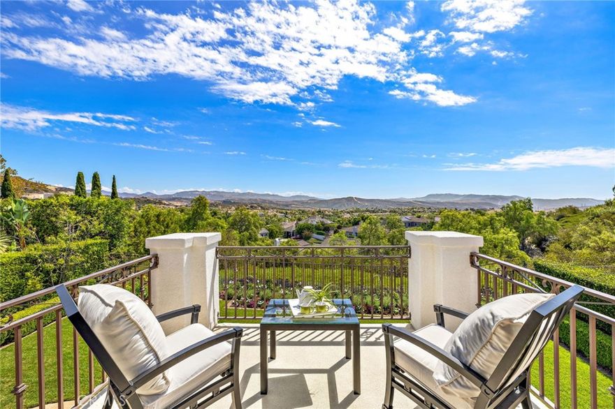TURN-KEY ELEGANCE IN TALEGA – VIEWS | CUL-DE-SAC | SPACIOUS LOT | REMODELED THROUGHOUT
Welcome to one of Talega’s most desirable floor plans, beautifully updated and ideally situated on a wide, level lot of over 10,000 sq ft.  Nestled in a private cul-de-sac, this stunning residence offers privacy, space, and luxury upgrades throughout.
From the moment you arrive, you’ll notice the fantastic curb appeal, mature landscaping, and porte-cochere with electronic gated entry leading into a private car courtyard—ideal for added security and functionality.
Step inside to a central hall plan featuring true hardwood flooring, elegant arched double doors, and an ideal blend of formal and informal living spaces. The living room and office flank the entry, while the formal dining room opens via French doors to an inviting enclosed courtyard—perfect for entertaining or quiet relaxation.
The fully remodeled chef’s kitchen is a dream, complete with Carrera marble countertops and backsplash, large center island, and stainless appliances including dishwasher, oven, microwave, and refrigerator. A sunny bay window breakfast nook flows into the spacious family room with an updated fireplace and beautiful views of the lush backyard.
First-floor bedroom suite, convenient laundry room, and stylish powder room complete the main level.
Upstairs, the grand primary suite spans the entire rear of the home and features a cozy retreat, fireplace, two private view patios, and a spa-like bathroom with double sinks and a private view deck. Three additional en-suite bedrooms and a large bonus room (ideal as a movie room, playroom, or in-law suite) provide plenty of space and flexibility for all lifestyles.
Step outside to your expansive backyard oasis—complete with a covered patio, built-in BBQ & bar, lush lawn, and plenty of room for a pool, putting green, playground, or full outdoor room. The lot is deep and wide, offering endless possibilities for outdoor living. 
The home is located on a quiet dog-leg cul-de-sac with minimal traffic and just steps from one of Talega’s scenic trails. The Talega community offers resort-style amenities including pools, parks, tennis courts, sports fields, and top-rated schools.
Minutes from the 5 freeway, San Clemente’s famous beaches, Vista Hermosa Sports Park, shopping, and the vibrant downtown scene—this is a rare opportunity to own a top-of-the-hill, move-in-ready home in one of San Clemente’s most coveted neighborhoods.