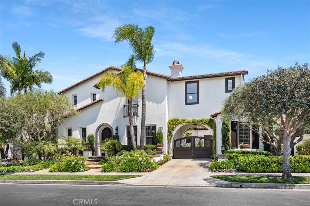 TURN-KEY ELEGANCE IN TALEGA – VIEWS | CUL-DE-SAC | SPACIOUS LOT | REMODELED THROUGHOUT
Welcome to one of Talega’s most desirable floor plans, beautifully updated and ideally situated on a wide, level lot of over 10,000 sq ft. Nestled in a private cul-de-sac, this stunning residence offers privacy, space, and luxury upgrades throughout.
From the moment you arrive, you’ll notice the fantastic curb appeal, mature landscaping, and porte-cochere with electronic gated entry leading into a private car courtyard—ideal for added security and functionality.
Step inside to a central hall plan featuring true hardwood flooring, elegant arched double doors, and an ideal blend of formal and informal living spaces. The living room and office flank the entry, while the formal dining room opens via French doors to an inviting enclosed courtyard—perfect for entertaining or quiet relaxation.
The fully remodeled chef’s kitchen is a dream, complete with Carrera marble countertops and backsplash, large center island, and stainless appliances including dishwasher, oven, microwave, and refrigerator. A sunny bay window breakfast nook flows into the spacious family room with an updated fireplace and beautiful views of the lush backyard.
First-floor bedroom suite, convenient laundry room, and stylish powder room complete the main level.
Upstairs, the grand primary suite spans the entire rear of the home and features a cozy retreat, fireplace, two private view patios, and a spa-like bathroom with double sinks and a private view deck. Three additional en-suite bedrooms and a large bonus room (ideal as a movie room, playroom, or in-law suite) provide plenty of space and flexibility for all lifestyles.
Step outside to your expansive backyard oasis—complete with a covered patio, built-in BBQ & bar, lush lawn, and plenty of room for a pool, putting green, playground, or full outdoor room. The lot is deep and wide, offering endless possibilities for outdoor living.
The home is located on a quiet dog-leg cul-de-sac with minimal traffic and just steps from one of Talega’s scenic trails. The Talega community offers resort-style amenities including pools, parks, tennis courts, sports fields, and top-rated schools.
Minutes from the 5 freeway, San Clemente’s famous beaches, Vista Hermosa Sports Park, shopping, and the vibrant downtown scene—this is a rare opportunity to own a top-of-the-hill, move-in-ready home in one of San Clemente’s most coveted neighborhoods.