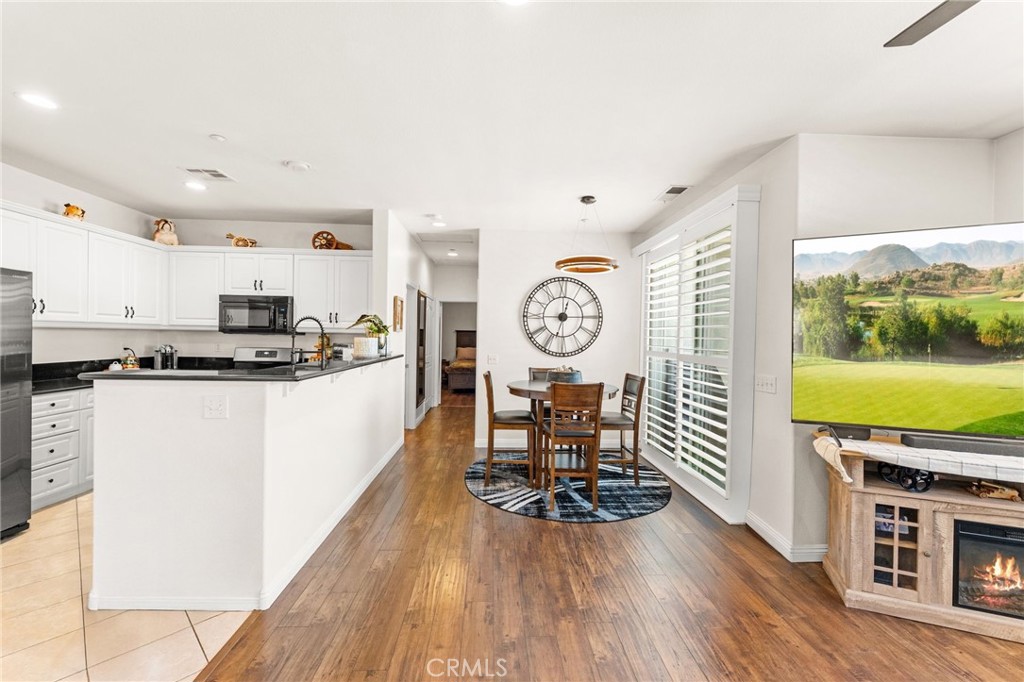 Step into this meticulously maintained, light-filled 2-bed, 2-bath condo nestled in the serene Casabella community—where affordability meets upscale living in a market that rarely offers both.
Every inch reflects care: modern updated floors flow through an inviting open layout, accented by granite countertops, stainless appliances, and 2 private balconies perfect for your morning coffee ritual. The nearly-new washer, dryer, and refrigerator are included—because the owner knows buyers need built-in value now more than ever.
A rare perk for a condo: enjoy a private two-car garage with direct access to the unit, giving you convenience, security, and storage without sacrificing a thing.
The spacious primary suite offers a large walk-in closet and dual vanities, making daily routines feel just a little more luxurious. Outside your doorstep, enjoy resort-style amenities: a sparkling pool, soothing spa, two playgrounds, sport court, and lush green belts—ideal for pets and weekend strolls. And for the commuter, easy access to the 215/15 freeways keeps San Diego, Temecula, and the Inland Empire within reach.
This isn’t just a condo—it’s a sweet spot where savvy buyers maximize budget, quality, and location. Move in, unpack, and start enjoying immediate comfort and convenience…no remodel required.