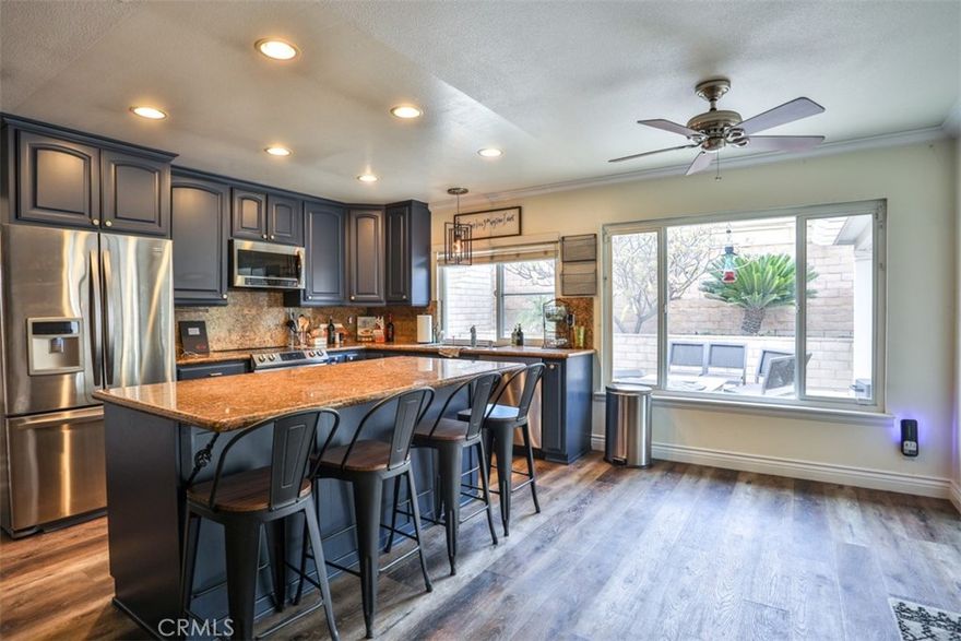 Welcome to 1476 Fernando Ave – a beautifully maintained single-story home on a generous 10,125 sq ft lot in Upland, offering comfort, quality, and easy everyday living.

Step inside to a bright, welcoming floor plan with engineered hardwood flooring that adds warmth and continuity through the main living areas. The spacious living room centers around a fireplace and flows into the dining area, creating a natural hub for relaxing, working, or hosting. The updated kitchen features granite countertops, a large island, under-cabinet lighting, tile flooring, and excellent storage — designed to support everything from quick meals to larger gatherings.

This home offers four comfortable bedrooms and two bathrooms, thoughtfully arranged for convenience and privacy. Dual-pane windows, copper plumbing, a whole-house fan, and other system upgrades reflect the ongoing care invested into the property.

The backyard is a true extension of the living space. Enjoy an expansive outdoor area with a built-in BBQ island (with sink and refrigerator), a spacious covered patio with recessed lighting and TV mount, and a spa — an ideal setting for everyday unwinding or hosting get-togethers. The wide lot provides RV access with covered RV parking and a two-car attached garage with workshop potential, offering flexibility for storage, hobbies, or projects.

Located in an established Upland neighborhood near parks, shopping, dining, and freeway access, this property offers a balanced blend of comfort and convenience. Whether you’re looking for a move-in-ready home with meaningful upgrades, space for outdoor enjoyment, or a property with versatility, 1476 Fernando Ave deserves a closer look.

Experience a home where thoughtful improvements and generous indoor-outdoor living come together. Schedule your showing and explore the possibilities on Fernando Avenue and make us an offer we can not refuse!