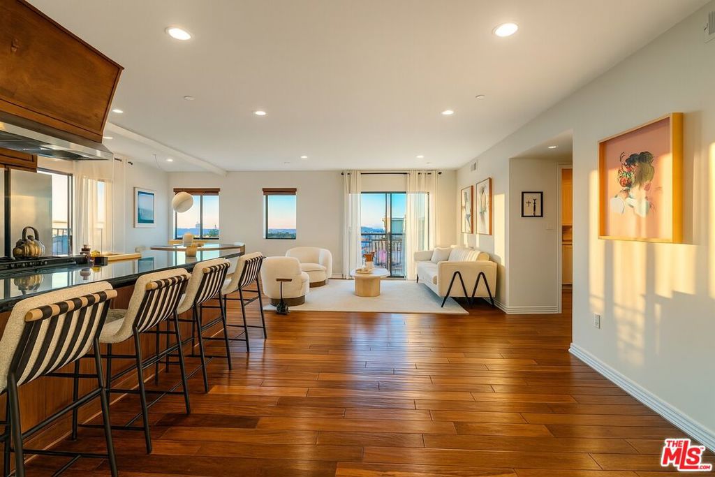 Welcome to your dream oasis in the heart of West Hollywood! Prepare to be blown away by the sheer magnificence of this stunning Spanish-style 2 bed, 2 bath apartment that exudes luxury and elegance. As you step inside, be enchanted by the enchanting open floor plan that gracefully allows a seamless flow of natural light to dance across the living space. Sunlight spills through the large French doors and brightens every corner of the apartment, providing a warm and inviting ambiance. From here, indulge your eyes with breathtaking panoramic city views, offering you a mesmerizing display of the ever-changing urban landscape.But that's not all! Step outside onto the charming patio and experience the perfect harmony of indoor-outdoor living. Sip your morning coffee while embracing the picturesque scenery or savor a delightful sunset dinner with friends, making the most of your private outdoor sanctuary.Recently adorned with brand new modern wood floors in the bedrooms, the living spaces exude comfort and sophistication, ensuring you feel pampered in every way. And let's not forget about the convenience of not one but TWO tandem parking spots, offering you unmatched accessibility in this bustling city.Ready to relax and unwind? Take a soothing soak in the community hot tub, meticulously serviced each week to provide you with the utmost relaxation and tranquility. But the indulgence doesn't stop there! Elevate your experience by heading to the rooftop retreat, where plush sofas and cozy seating areas await, granting you exclusive access to awe-inspiring views that stretch from the city skyline to the sparkling ocean.The kitchen is an epicurean's delight with its large center island and sleek granite counters. Complete with stainless steel appliances, including a stove, dishwasher, and refrigerator, cooking and entertaining will be a breeze in this modern haven.Additionally, a washer and dryer in the unit ensure laundry day is a seamless and effortless affair. No more trips to a communal laundry room; you'll have your own private laundry sanctuary right at your fingertips.Embrace the epitome of luxury living in this Spanish-style masterpiece, where elegance, comfort, and convenience converge into one extraordinary apartment. Don't miss the chance to make this your new home sweet home! Contact us now to schedule a private tour and experience the magic of this West Hollywood gem. Unit comes UNFURNISHED, photos show how the unit could be staged/furnished by new renter!