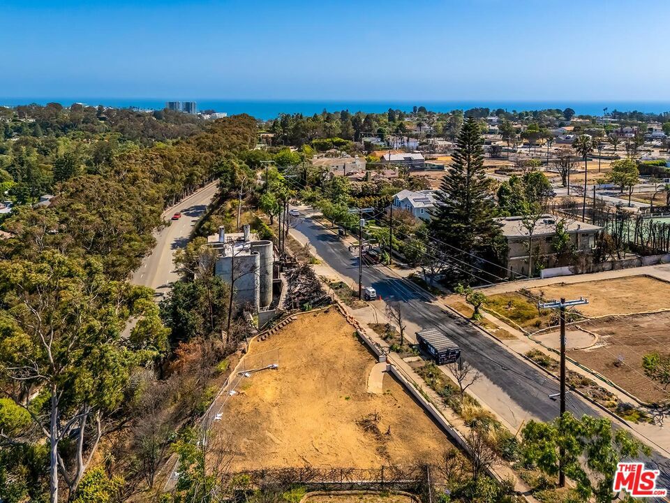An extraordinary opportunity to build a custom estate on the lowest-priced lot over 9,000 square feet currently available in the Alphabet Streets! This rare 9,450 square foot parcel -- approximately 75% of which is flat -- is perched above the iconic Sunset Blvd., with sweeping views over Rustic Canyon and potential ocean views from a second story. Moments from Palisades Village, top-rated schools, and -- of course -- the beach, this site offers privacy, scale, and exceptional value for end-users and developers alike.