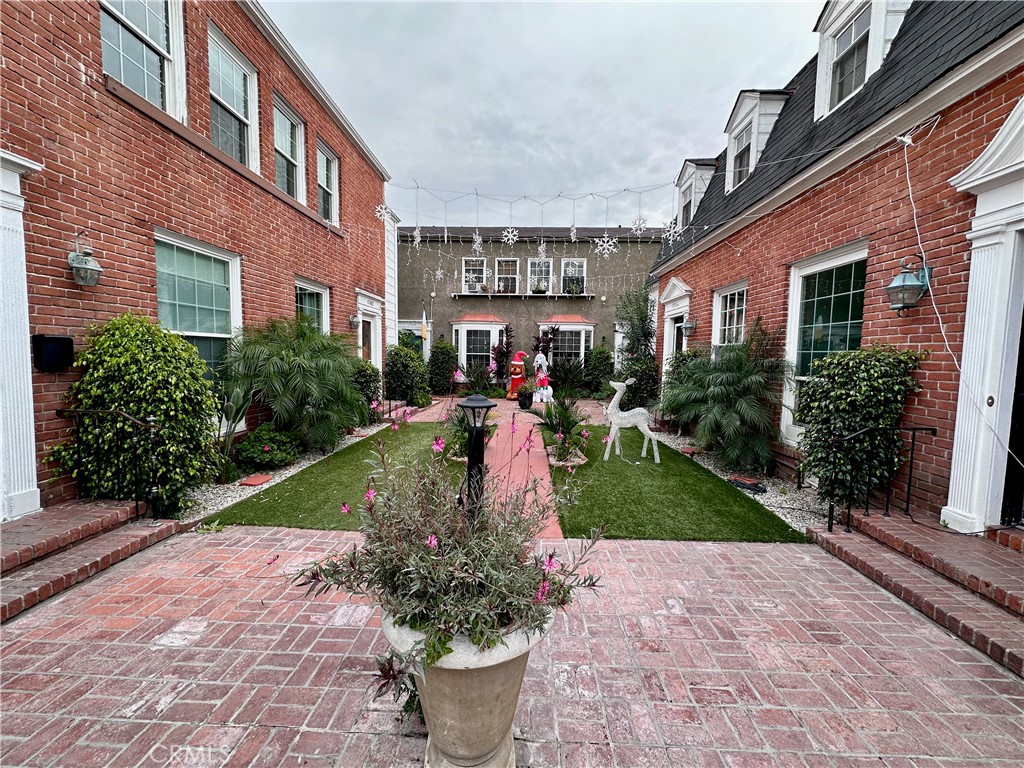 Your own private Idaho... in the prime of Hollywood. Tucked behind a private gate you'll find a time machine. This super cute and recently updated townhome style unit is a throwback to the golden age of Hollywood. Plenty of light, cozy outdoor space in back, 1 car space garaged. Walk to the Bowl, Hollywood Blvd, restaurants, shops, and more.