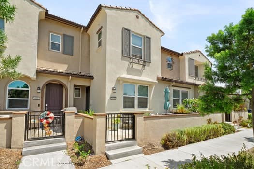 Welcome to 16053 Voyager Ave! This gorgeous townhouse features 3 bedrooms and 2 1/2 baths and is centrally located in Chino with wonderful amenities. When you walk into the home you are greeted with an open floor plan, the kitchen and family room are on the lower level with direct access to the 2 car garage. The kitchen features stainless steel appliances, a large island and beautiful laminate flooring. Upstairs you will find all 3 bedrooms, laundry room and 2 full bathrooms. This property is perfect for empty nesters, a young family or a first time buyer and also has a nice sized patio in the front of the property.