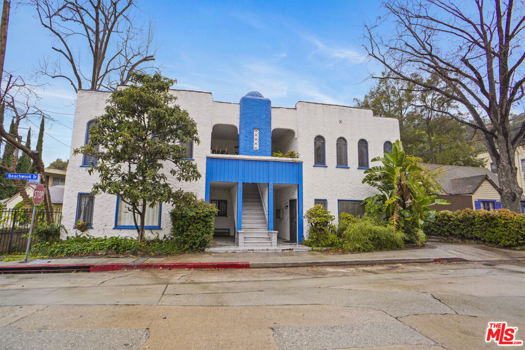 6100 Glen Oak St is a spacious two-bedroom/two-bathroom apartment nestled in the heart of Beachwood Canyon, right beneath the iconic Hollywood Sign, with easy access to the 101 freeway, local hiking trails, and all that Hollywood has to offer. This 1920s Spanish-style apartment features elegant hardwood floors, beautiful tiling, stunning arched hallways, original coved ceilings, and a fireplace that adds character and warmth. The unit offers central A/C and heating, an in-unit washer and dryer, a dishwasher, and one designated parking spot. Uniquely situated, this unit has its own private area, sharing no walls with any other units, and features a large private back patio perfect for relaxing or entertaining. Enjoy beautiful green views of the canyon and walkability to Beachwood Market and nearby cafes. A perfect blend of historic charm and modern comfort in one of LA's most sought-after neighborhoods. Square footage is an estimate, tenant to verify.