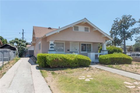Photo of 1458 W 49th ST, Los Angeles, CA 90062 (MLS # BB26120089)