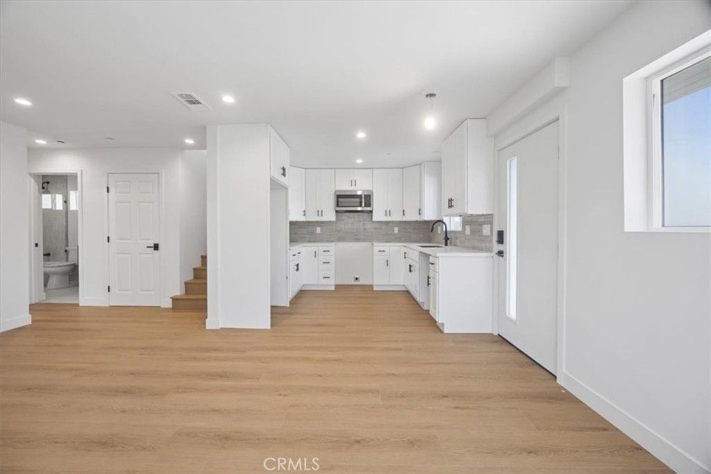 Photo of 1154 W 67th St, Los Angeles, CA 90044 (MLS # PF26062001)