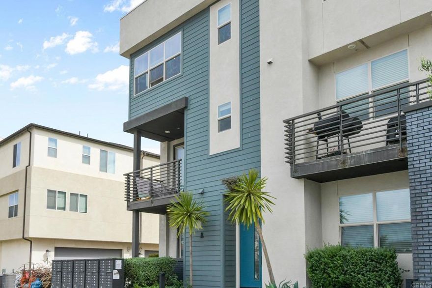 Beautiful Corner Townhome in Sought-After Millenia!  Rarely available three-story corner unit in the highly desired Millenia community!  This spacious townhome features an open-concept living area that seamlessly connects the living room, dining room, and kitchen perfect for modern living and entertaining.  The chef’s kitchen boasts elegant quartz countertops, shaker cabinets, a custom wood island, and stainless steel appliances. Natural light pours in through large windows and the balcony off the living room, highlighting the home’s beautiful custom stacked-stone accent wall.  Enjoy energy efficiency with paid solar and a tankless water heater to help lower monthly costs.  The first floor offers a full bedroom and bathroom with its own private patio ideal for guests or multigenerational living. Upstairs, you’ll find three additional bedrooms, including a stunning primary suite with a walk-in closet and a luxurious bathroom. The laundry room is conveniently located on the top floor. Step outside and enjoy everything Millenia has to offer a sparkling pool, parks, dog park, community garden, and more. All just minutes from Otay Ranch Town Center, dining, and freeway access.