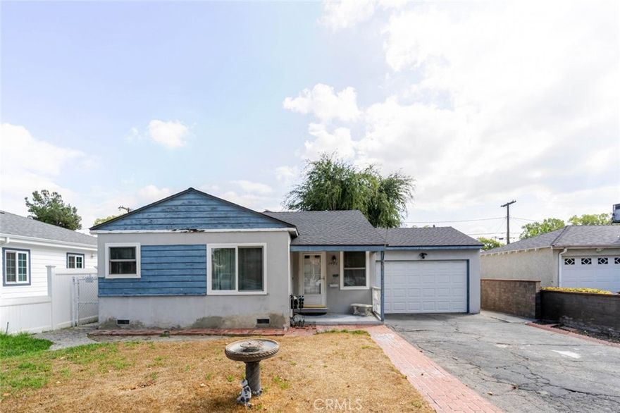 Welcome to this charming single-family home offering 2 bedrooms, 1 bathroom, and 910 sq. ft. of comfortable living space on a 5,999 sq. ft. lot. Inside, you'll find recessed lighting, ceiling fans, and a bright kitchen with tiled countertops. A dedicated laundry room adds convenience, while the attached 1-car garage comes with built-in cabinets for extra storage. The long driveway provides ample parking, and the private front and back yards create plenty of outdoor space to relax or entertain. The yard also features, mature naval orange and blood orange trees, adding natural beauty and a touch of citrus fragrance to the landscape. Home features, tankless water heater, central heating and AC, water filtration system and copper plumbing. A bonus shed in the backyard offers even more storage options. Additionally, there is a permitted structure in the backyard currently being used as an office. This home is perfect for those seeking comfort, functionality, and room to grow. Welcome Home!