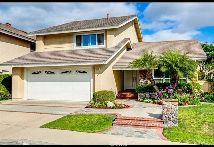 Beautifully Remodeled Home in Highly Sought-After Neighborhood w/4 Bedrooms, 3 Remodeled Baths (Includes Main Floor Bedroom & Full Bath), w/Full Driveway. Large 2-Car Garage with 220v for car charger. Highly Upgraded Home w/Remodeled Kitchen, Newer Dual Paned Windows, Newer Flooring, Crown Molding, Recessed Lighting, Newer Raised Panel Interior Doors & Hardware, Custom Paint, Vaulted/Smooth Ceilings, Window Shutters, Amazing Kitchen has Stone Counters, Plenty of Cabinetry Inc. Lazy Susan Corners, Stainless Steel Appliances, Breakfast Nook w/Large Pantry & Windows Overlooking Private Backyard, Spacious Family Room has Remodeled Fireplace w/Wood Mantle/Surround & Tiled Hearth, French Double Doors w/Sidelights Open to the Backyard, Main Floor Remodeled Bath has Vanity w/Stone Counter, Custom Tiled Shower & Recessed Lights, Large Master Bedroom has Newer Floor, Closet w/Mirrored Sliding Doors, Gorgeous Remodeled Master Bath has Dual Vanity w/Stone Counter, Oval Tub/Shower w/Glass Slider & Stone Tiled Wall & Floor, Walk-In Closet w/Organizers has Mirrored Sliding Doors, Secondary Bath has Vanity w/Stone Counter, Tile Floor, Tub/Shower Combination w/Tiled Wall & Glass Slider, Large Private Backyard has Stone Patio w/Brick Accents, Orange, Lemon & Avocado Trees, Lush Landscape, Grass, Indoor Laundry Room, Steps to Resort Style Assoc. Amenities, Walk to Award Winning Irvine Schools Inc. Prestigious Northwood High, Close to Shopping/Parks/Trail. REFRIGERATOR/WASHER/DRYER Included!