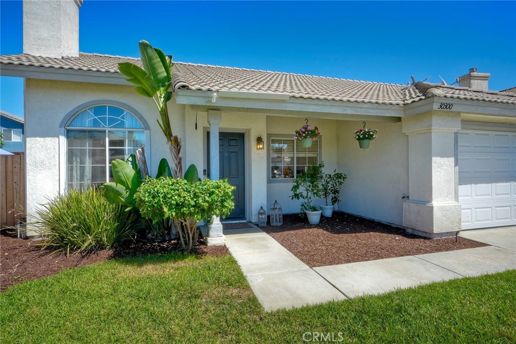 Welcome to 30300 Savannah Oaks, a tastefully updated single story home blending modern style with everyday comfort. It is conveniently located close to shops and restaurants plus is also located within the Temecula school district. It has really nice curb appeal. As you enter the home you step into a spacious living room with vaulted ceilings and lots of natural light with a cozy fireplace. The open concept floorplan seamlessly connects the living room with a large dining area, perfect for everyday living and entertaining. Upgrades include luxury vinyl plank flooring throughout the whole home, complimented with new modern baseboards. Plus the whole house was custom painted. The private and practical kitchen layout has lots of storage and includes a newer dishwasher. There is also space for a breakfast bar. The open flowing floorplan leads to 3 spacious bedrooms and 2 bathrooms. The primary bedroom suite features a large walk in closet and dual sinks. Every room enjoys lots of natural light. The private backyard is low maintenace and has a new fence along the back with a nice retaining wall. There is a 2 car garage. The newer washer and dryer are included items. Low tax rate plus no HOA. Schedule a showing to see this lovely home!!