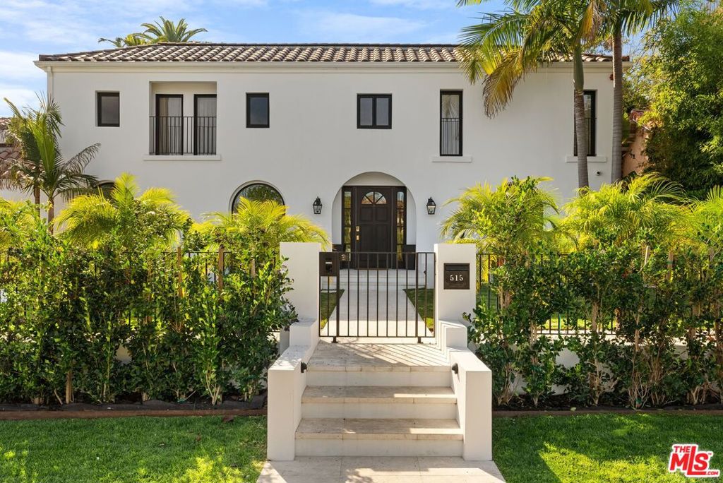 Nestled in the heart of the iconic Beverly Hills Flats, this exquisite estate blends timeless Mediterranean charm with modern luxury & thoughtful design. Completely remodeled from the studs between 2020-22, no detail has been overlooked in the meticulous renovation of this incredible home. Step inside to discover a bright, open floor plan flooded with natural light, showcasing impeccable craftsmanship & designer finishes throughout. The downstairs spacious layout includes an ensuite bedroom, powder room, temperature controlled wine closet, enclosed formal dining room which could be an additional bedroom or office, formal living & family rooms, and a seamless indoor outdoor flow. The spacious chef's kitchen, outfitted with premium appliances and new countertops flows seamlessly into the living room and out to the entertainer's backyard. Upstairs you'll find 4 bedrooms, all ensuite, with a curated design and charm. There is also a separate theatre room for movie nights at home. The primary suite is a true retreat, boasting a spacious walk-in closet & a spa-like bathroom with luxury fixtures and finishes. A newly built ADU, complete with a full bathroom, offers incredible flexibility. Currently used as a gym with a sauna, it's ideal for guests, a live-in nanny, or a private office space. The expansive backyard has been masterfully designed to feel both private and grand, with a sparkling pool, full basketball court, and a covered patio equipped with a built-in TV perfect for al fresco dining and year-round entertaining. It truly makes the lot feel enormous. Just moments from world-renowned Rodeo Drive, this exceptional home provides unrivaled access to the best of Beverly Hills, including luxury shopping, fine dining, and cultural landmarks.With all major systems recently updated this is the rare blend of location privacy, & luxury, and your opportunity to own a fully remodeled, move-in-ready home in one of L.A.'s most prestigious neighborhoods. This is Beverly Hills living at its finest.