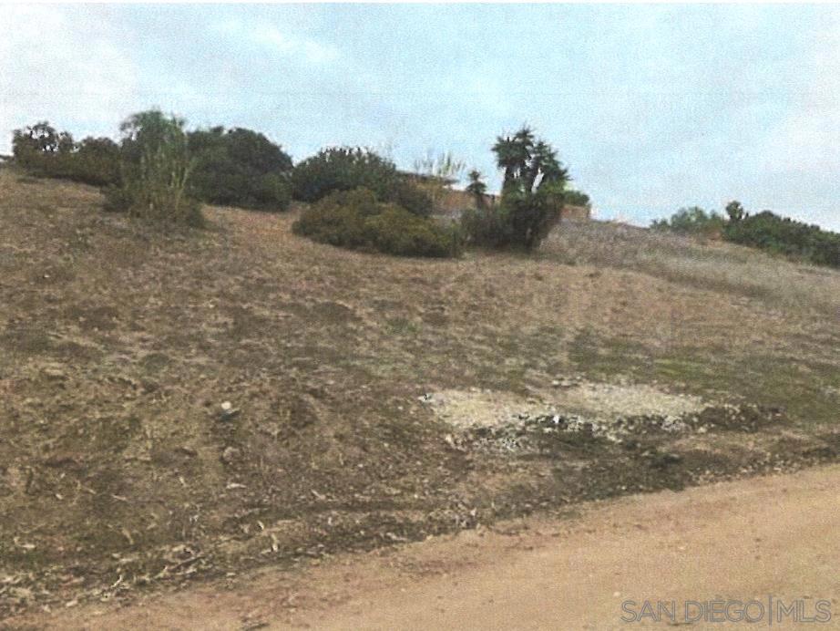*Please Read* This is the lowest-priced lot in National City, offering an excellent opportunity for investment. While zoned RS-2, building on this 6,697 square foot lot is unlikely due to the need for an easement through 16th St. However, this parcel offers significant potential for alternative uses, such as storage or parking, especially with some grading work. Situated directly behind 2714 E 16th St, with access via the unpaved road on 17th St, this lot is nestled in a mature neighborhood with easy access to downtown San Diego via I-5 and I-805. The ongoing demand for land in San Diego County, coupled with potential future infrastructure improvements, makes this property a strategic hold for visionary investors or developers looking to maximize its value. Don’t miss out on this rare opportunity to own a prime piece of land in a desirable location. Please see confidential remarks for more details.