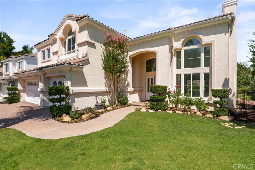 SoCal living at its finest...welcome to this stunning 5-Bedroom home in the exclusive gated community of Calabasas View, on the border of Calabasas and Agoura Hills. Located on a quiet cul-de-sac with breathtaking views, this 2-story home offers 5 spacious bedrooms, 4 1/2 bathrooms, 3,602 square feet of living space, and a 3-car garage—perfect for those seeking comfort and style. 
Enjoy an open floor plan with vaulted ceilings, abundant natural light, and a formal dining room. A downstairs bedroom and private full bath offer convenience for guests or multi-generational living.  Recently remodeled, the chef-inspired kitchen opens to the family room, making it ideal for entertaining. Upstairs, enjoy a well-sized landing, adding a family flex space for a desk or play area. Retreat to the large, private primary bedroom with a fireplace, an expansive en-suite bathroom, and a spacious walk-in closet.  Ideal for outdoor gatherings, the backyard offers sweeping canyon and hillside views, a spacious patio, and a grassy area perfect for play or pets. Inside, the home has updated wood-look flooring, carpeting, and a fresh coat of paint throughout — creating a modern, move-in-ready feel. 
Set in a picturesque, tree-lined neighborhood, this rare gem is conveniently located near the 101, Erewhon, The Commons of Calabasas, a 12-minute drive to the Westlake Village Promenade and a 15-minute drive to the beaches of Malibu and Pepperdine University. Located in the award-winning Las Virgenes School District, the home is near De Anza Park, biking, and hiking trails. Originally built by Toll Brothers, this home is perfect for those who desire serene living with easy access to Malibu and surrounding areas. Don't miss the opportunity to call this beautiful home yours!
(Also available for lease. Please inquire with listing agent.)