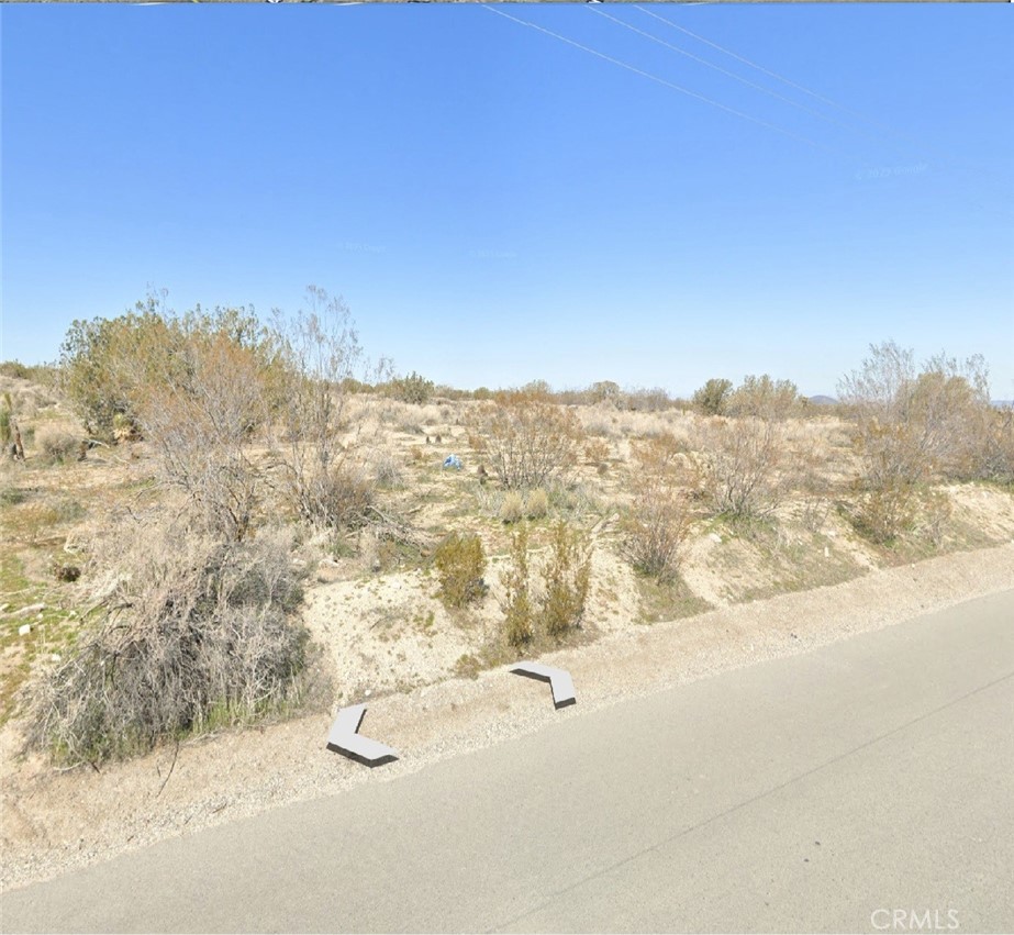 Expansive 9.8-acre flat lot in Pinon Hills, CA, zoned LAC-11, with paved road frontage and power lines at the street. This zoning allows for low-density agricultural and residential uses, making it ideal for a custom estate, ranch, or long-term investment.
Pinon Hills is known for its quiet rural setting, mountain views, and convenient location, offering a balance of seclusion and accessibility. Residents enjoy proximity to the Angeles National Forest, Mountain High Ski Resort, and Victor Valley amenities, making this a perfect spot for year-round living or recreational use.
Property Highlights:
Lot Size: 9.8 acres – flat and usable
Zoning: LAC-11 (Low Density Agricultural/Residential)
Access: Paved road frontage
Utilities: Power lines in front (buyer to verify water/septic requirements)
Setting: Desert & mountain views with rural charm
Potential Uses: Custom home, ranch, equestrian, or investment
A rare opportunity to own nearly 10 acres with zoning flexibility and infrastructure nearby. Buyer to verify zoning, utilities, and building requirements with San Bernardino County.