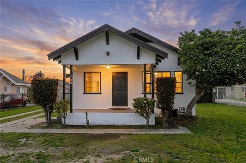 Photo of 1100 W 103rd Street, Los Angeles, CA 90044 (MLS # SR26042733)