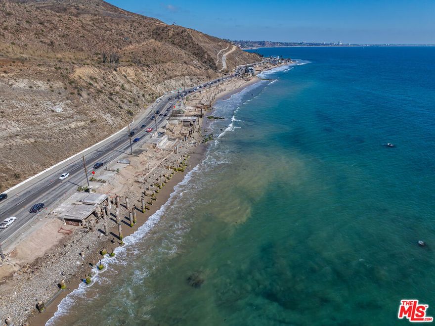 Enviously located on one of Malibu's most coveted beaches and among the closest beachfront addresses to Santa Monica (and the rest of Los Angeles), this property presents an extraordinary opportunity. Lot Size: 2,823 SF.   Previous Residence: 3,264 SF (one of the larger homes in the area).   Build Potential: CEQA and Coastal Commission review are suspended under emergency provisions, provided the new construction is substantially in the same location and does not exceed 110% of the original home's footprint or height. Entitlement Advantage: The rebuilt home can be up to 3,557 SF without triggering CEQA or Coastal Commission review, so long as it remains consistent with the prior legally established footprint and location. Historical Plans:   The original city-approved plans for the 2005 home (which was lost to fire) may be available from the original builder, providing a valuable head start for design and permitting. This rare entitlement pathway - combined with the potential access to previously approved plans and the irreplaceable location on one of Malibu's most desirable and convenient beaches, makes 19222 Pacific Coast Highway an unparalleled canvas for a new luxury oceanfront residence.