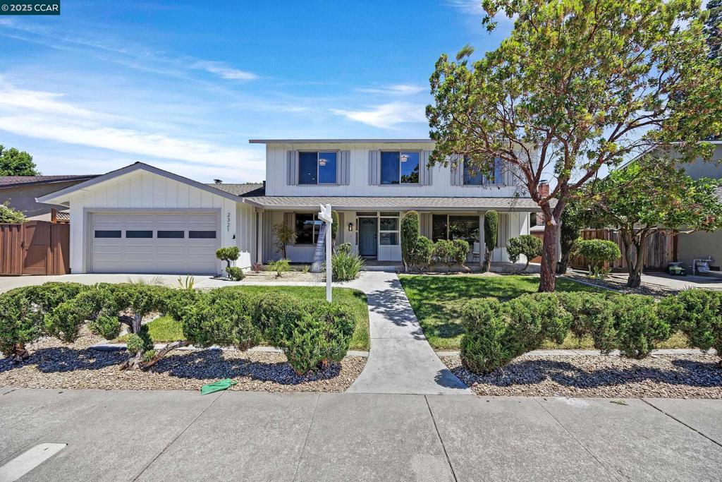 Welcome to 2321 Sandpiper Way, a masterfully renovated residence nestled in the highly sought-after Birdland neighborhood of Pleasanton. This elegant six-bedroom, three-bathroom home has been reimagined with sophisticated design elements and premium upgrades throughout. Step inside to discover a light-filled interior with new wide-plank flooring, fresh designer paint inside and out, custom baseboards, and all-new lighting that highlights the home’s clean, modern aesthetic. The formal living and dining rooms offer refined spaces for entertaining, while the heart of the home—a fully remodeled kitchen—features quartz countertops and high-end appliances. The family room features a cozy fireplace and flows seamlessly to the beautifully landscaped backyard, where a spacious deck and mature trees create a serene outdoor retreat. A desirable downstairs bedroom and full bath provide comfort and flexibility for guests or multigenerational living. Upstairs, five additional bedrooms offer generous space, including a luxurious primary suite with spa-inspired finishes. Every bathroom has been completely remodeled with stylish tilework, contemporary countertops, and modern fixtures. Located just minutes from top-rated schools, parks, and downtown Pleasanton, this home is a 10!