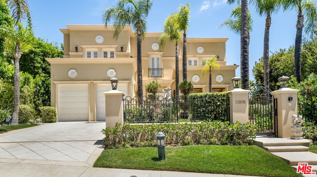 Explore the pinnacle of luxury living in this stately manor located inside the world-renowned enclave of Mulholland Estates. Step inside to find a bevy of custom architectural and design elements, including grand staircase, wraparound mezzanine, a library with floor-to-ceiling bookshelves. Entertain esteemed guests in the step-down family room with wine bar and movie screen. The welcoming kitchen is a gourmands dream, featuring custom Shaker cabinetry, seated island, and is annexed to the formal dining room with steps to the immaculate grounds for indoor/outdoor dining. The exquisitely manicured grounds and panoramic views are ideal for hosting lavish soirees and enjoying citrus-sweet sunsets and feature dining loggia, large pool, spa, cabana, stone terraces, and front courtyard with fountain. This triumph of opulent luxury combines architectural and interior design mastery with the peace and privacy of a truly exclusive community.