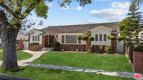 Photo of 10411 Saint James Avenue, South Gate, CA 90280 (MLS # 26670983)