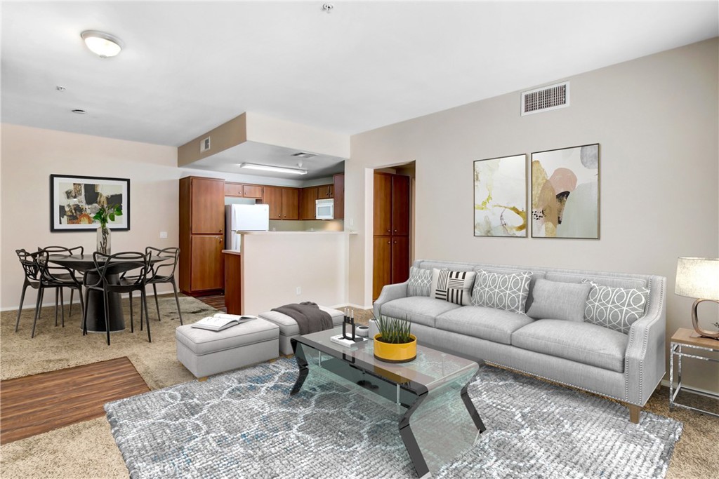 Welcome to the beautiful GATED community of Temecula Creek Village! Just a stones throw away from the 15 freeway, this condo offers convenience and the best in amenities! Upstairs unit offers 864 square feet of thoughtfully designed living space, featuring 1 spacious bedroom, 1 full bathroom, and a bright, open layout ideal for comfortable living or entertaining. This home boasts a clean, modern aesthetic with warm, inviting touches throughout. The living room opens to a private patio accessible from both the living area and bedroom—perfect for morning coffee or evening relaxation. The primary bedroom is generously sized and offers direct patio access, creating a seamless indoor-outdoor flow. The bathroom features a shower/tub combo and tasteful finishes, while the in-unit laundry with washer and dryer adds everyday convenience. Additional highlights include central heating and air, dual-pane windows, ample closet space, and a detached storage closet for extra belongings. Residents enjoy access to a wide range of resort-style amenities, including a pool, spa, SAUNA, clubhouse, fitness center, racquetball court, tot lot, and scenic walking trails—all within a beautifully landscaped and securely gated community. This condo offers unbeatable access to SHOPPING, DINING, and ENTERTAINMENT, including the renowned PECHANGA Resort & Casino and Temecula’s celebrated WINE COUNTRY. Whether you're a first-time buyer, downsizer, or investor, this turnkey property delivers the perfect blend of style, comfort, and location. Don’t miss your chance to enjoy resort-style living in one of Southern California’s most vibrant and desirable neighborhoods.